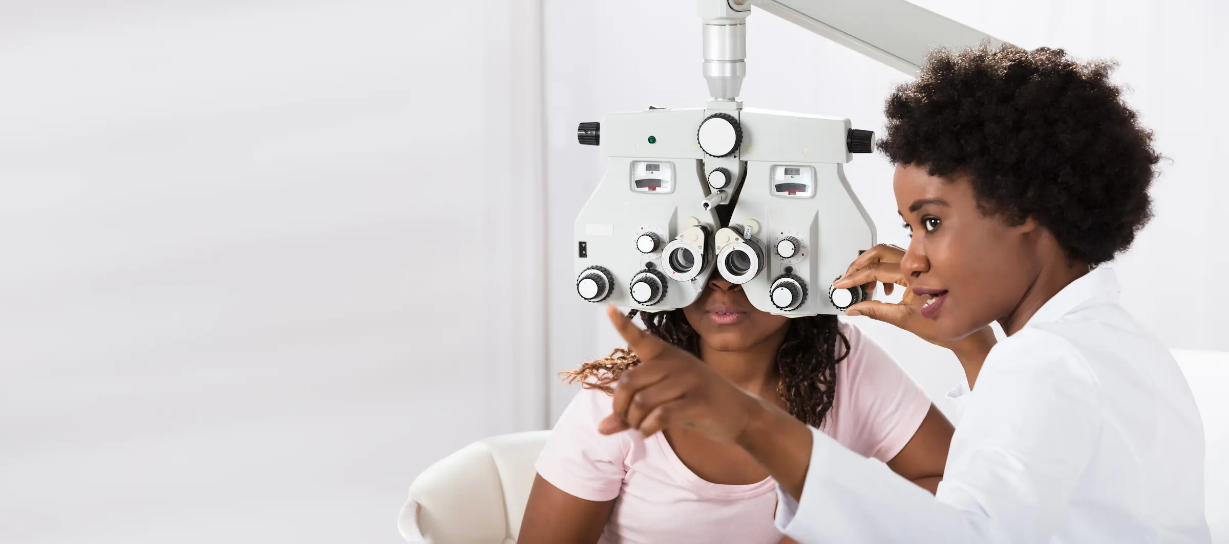 Opthalmologist performing eye exam