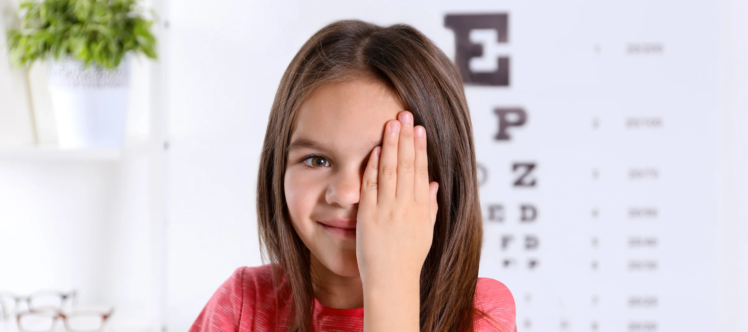 Young girl getting an eye exam