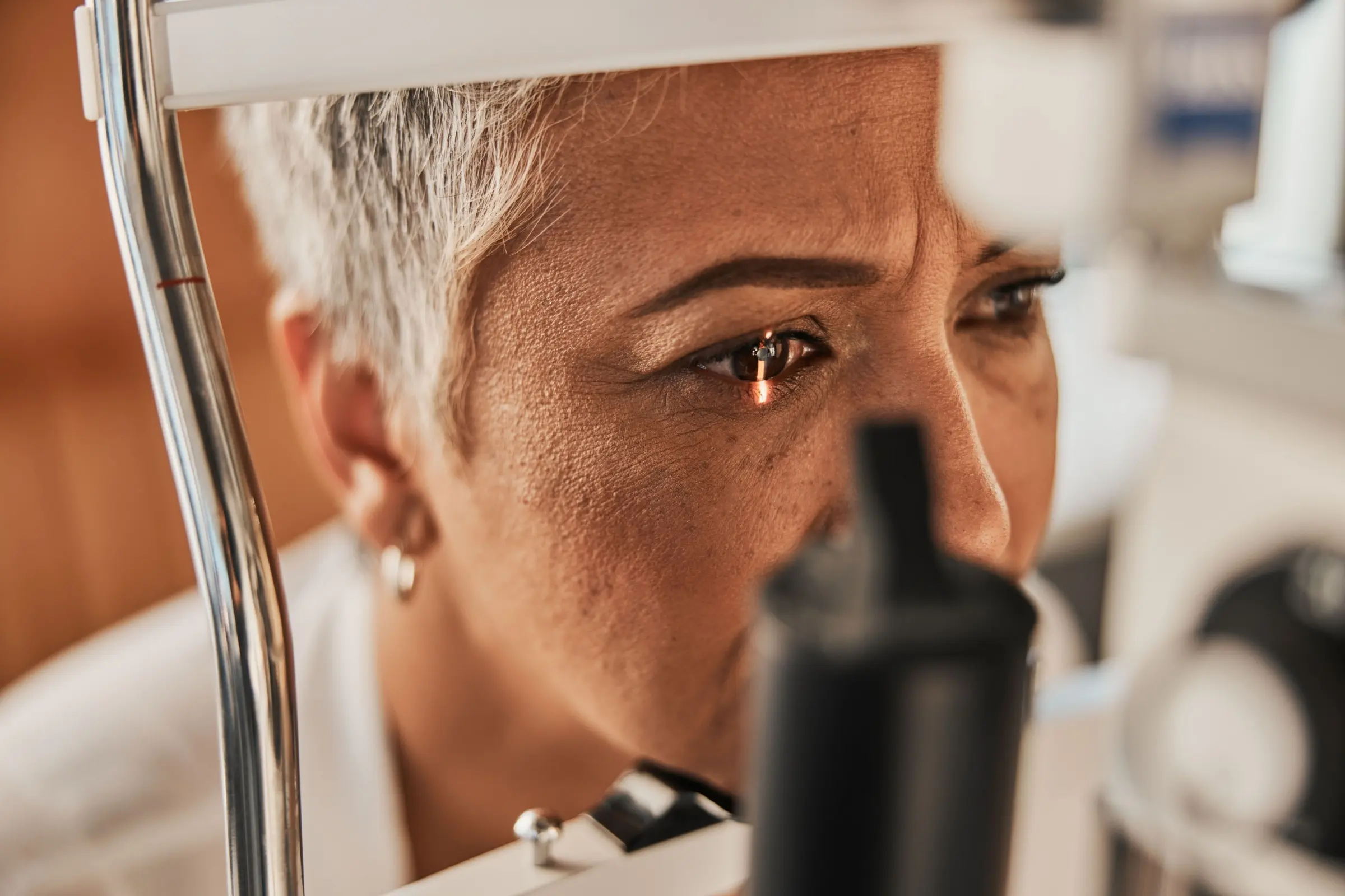 senior woman in eye exam